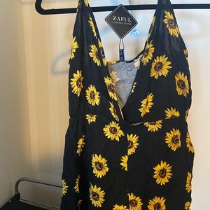 Black romper with sunflower pattern